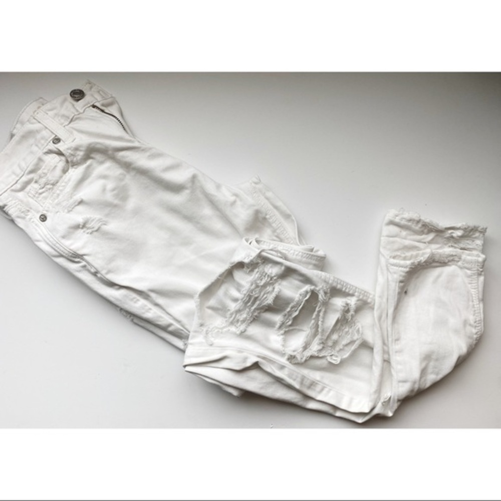 American Eagle Outfitters • White Destructed Mom Jeans